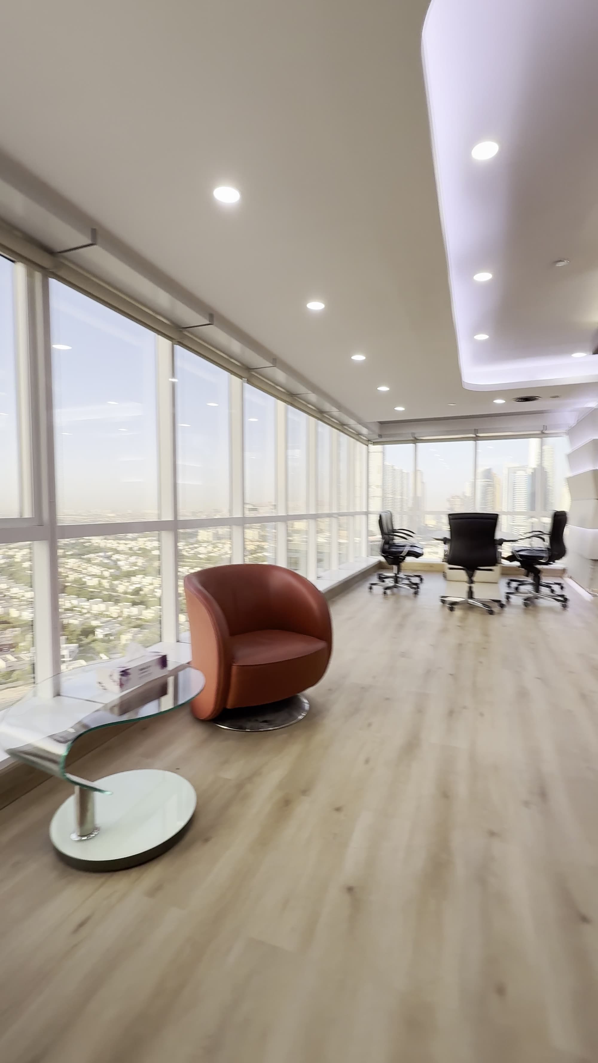 CEO office seating with Dubai skyline view